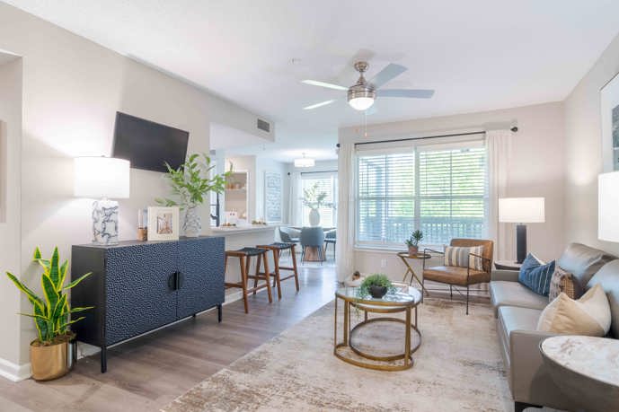 Renovated Living Room With Hardwood Style Flooring And Breakfast Bar